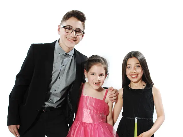 In this image we can see three children standing on the surface.