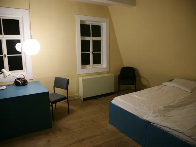 On the left it is a study chair, table. There is a light, on the right side these are the beds