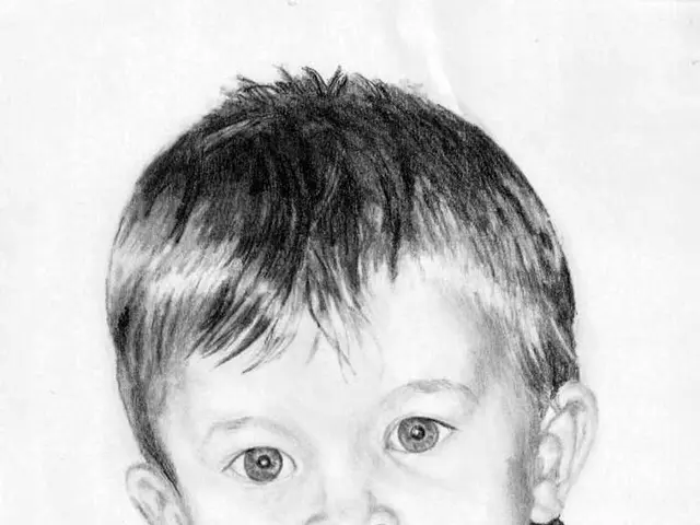 In this image there is a picture of a kid.